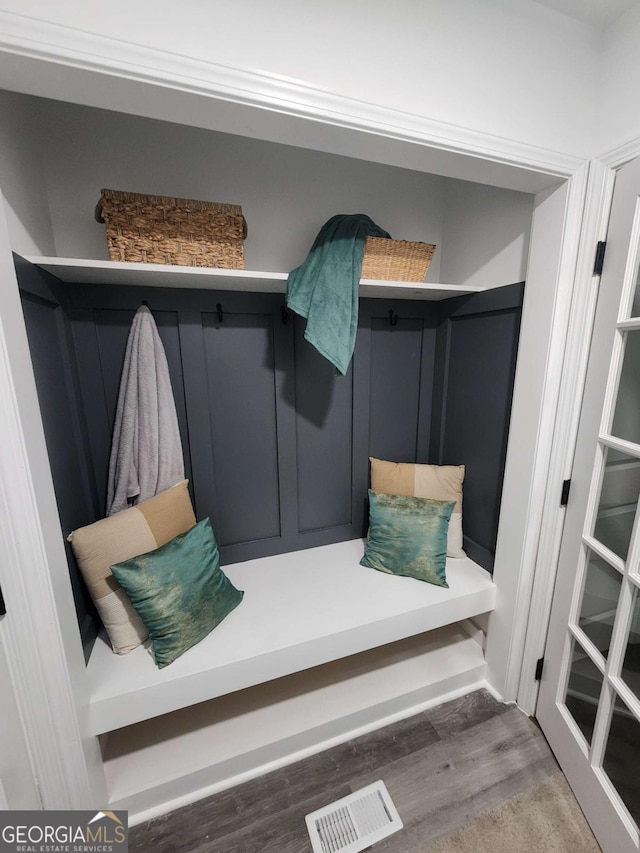 mudroom featuring dark wood-type flooring