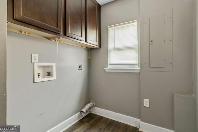 washroom with cabinets, washer hookup, dark wood-type flooring, electric dryer hookup, and electric panel