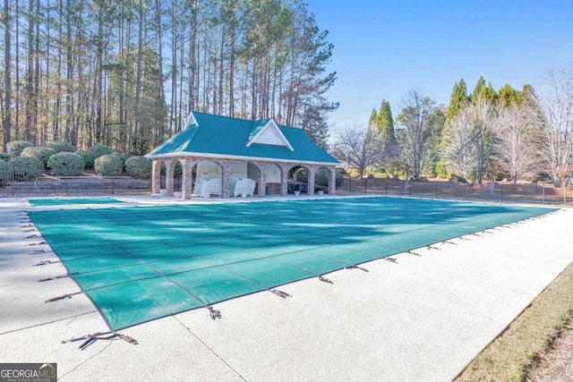 view of swimming pool featuring a patio