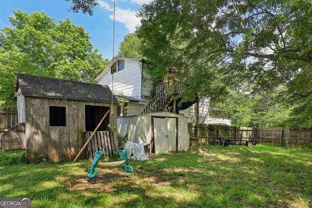 view of outbuilding with a lawn