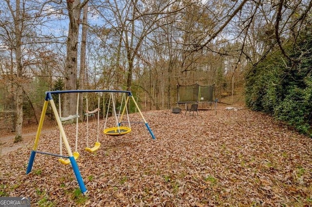 view of playground with a trampoline