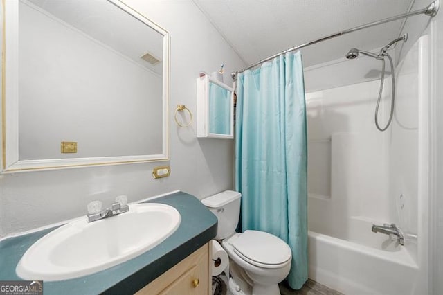 full bathroom featuring shower / bath combination with curtain, toilet, and vanity