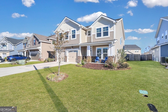 view of front facade with a front yard, a garage, and central air condition unit