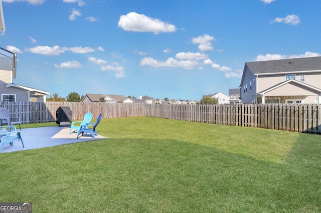 view of yard with a patio area