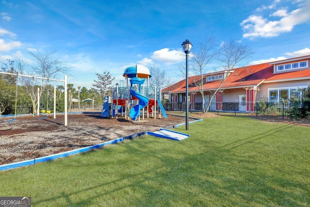 view of play area with a lawn