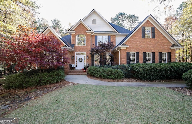 view of front of home featuring a front lawn