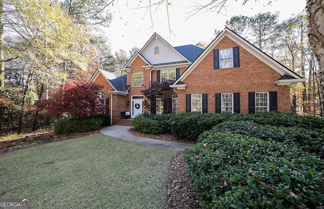 view of property with a front lawn