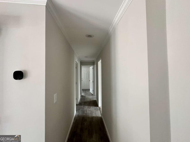corridor with baseboards, dark wood-style floors, and crown molding