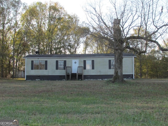 view of front of home with a front yard