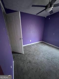 unfurnished bedroom featuring carpet flooring and ceiling fan