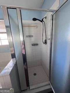 bathroom with walk in shower