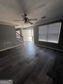 unfurnished living room with ceiling fan, hardwood / wood-style floors, and a textured ceiling