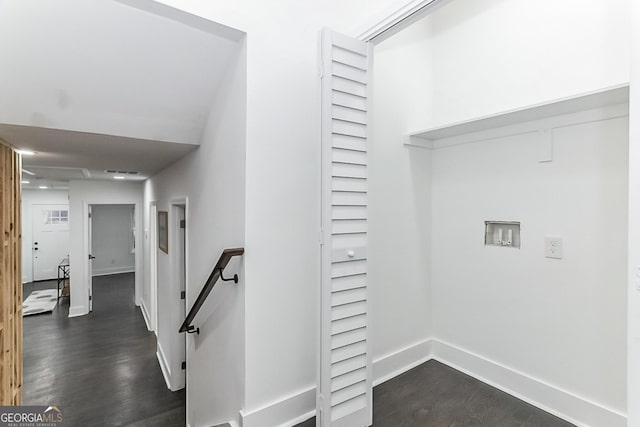 hallway with dark wood-type flooring