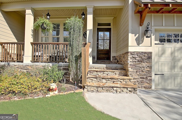 doorway to property featuring covered porch