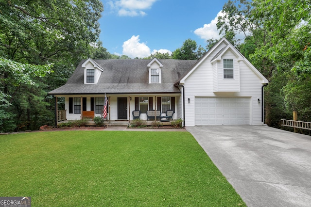 cape cod house featuring a front yard, a porch, and a garage