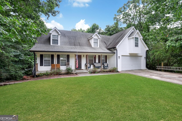 cape cod home featuring a front yard, a porch, and a garage