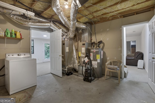 basement featuring washer / clothes dryer and water heater