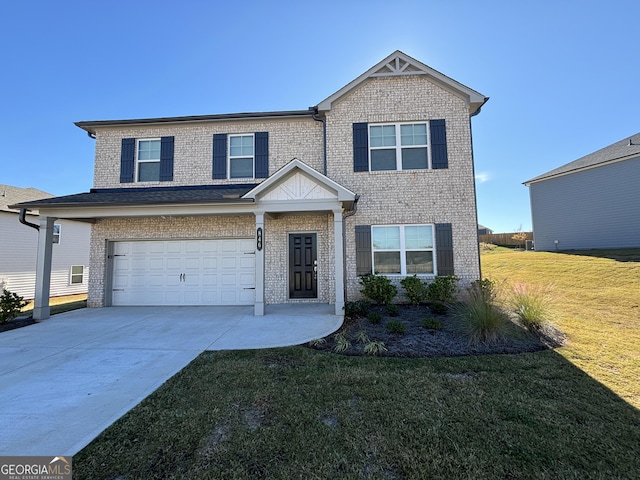 view of front of home with a front lawn and a garage