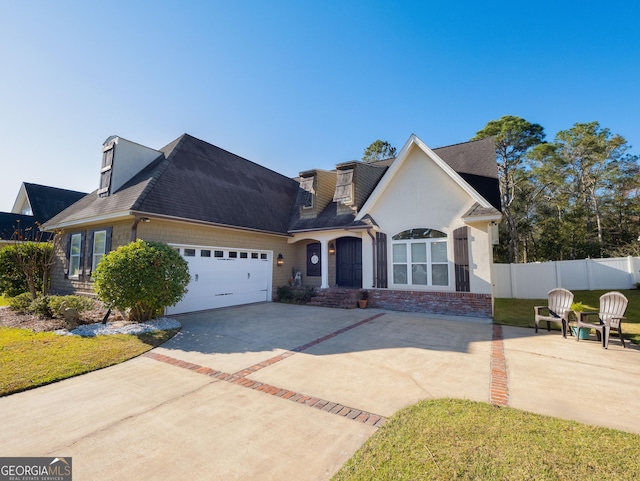 view of front of home featuring a garage