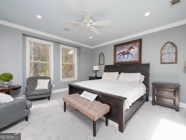 bedroom with light carpet, crown molding, and ceiling fan