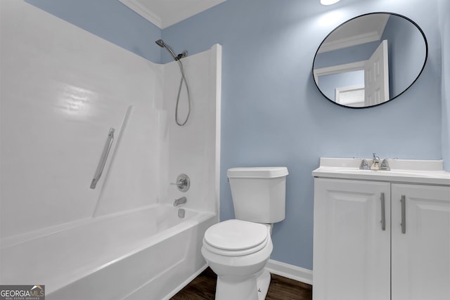 full bathroom with vanity, crown molding, shower / washtub combination, toilet, and wood-type flooring