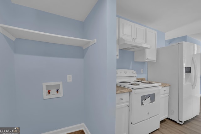 kitchen with white appliances, white cabinetry, and light hardwood / wood-style flooring