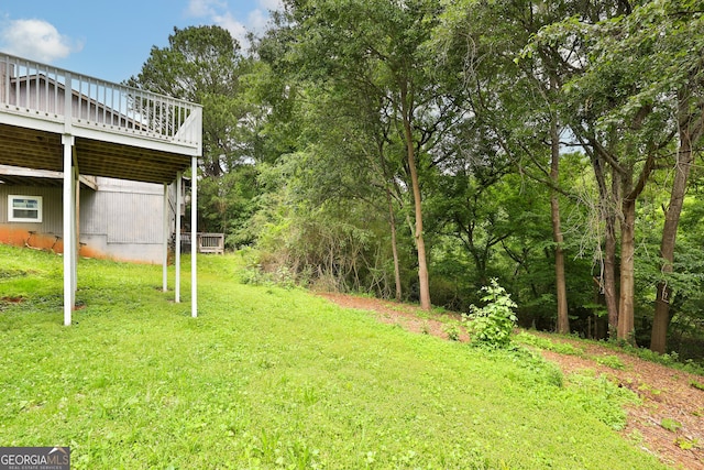 view of yard featuring a deck