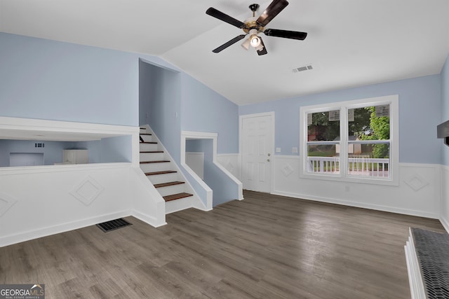 unfurnished living room featuring ceiling fan, dark hardwood / wood-style flooring, and lofted ceiling