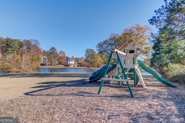 view of play area with a water view