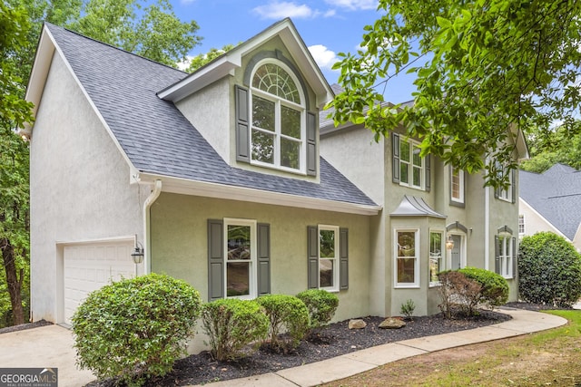 view of front of home with a garage