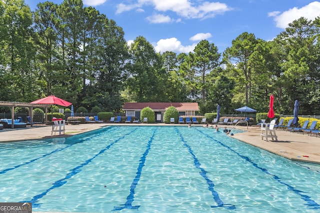 view of pool featuring a patio area