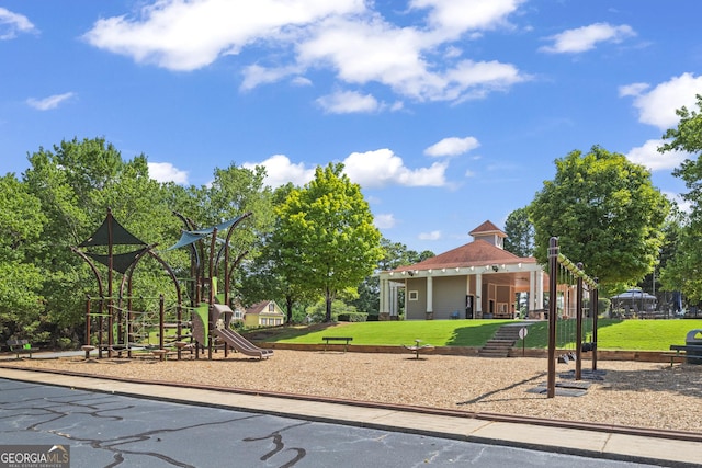 view of playground featuring a lawn