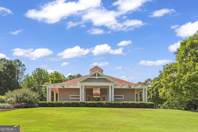 view of front of home with a front yard