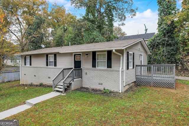 ranch-style home with a front yard