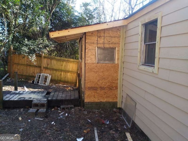 exterior space featuring a wooden deck