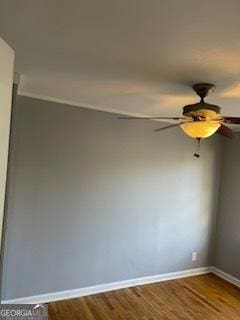 unfurnished room featuring hardwood / wood-style flooring