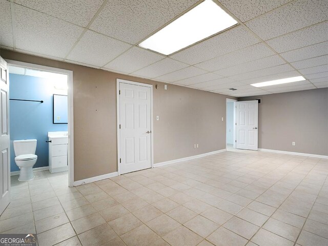 basement with a drop ceiling