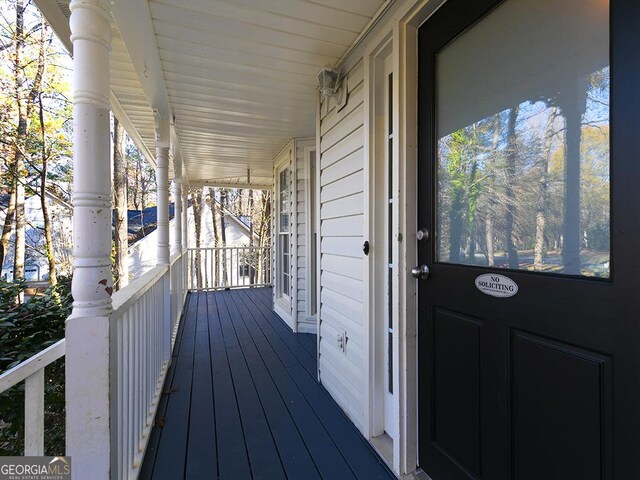 deck with covered porch