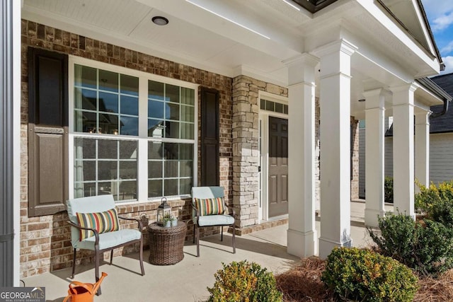 doorway to property with covered porch