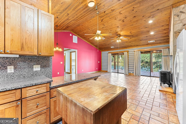 kitchen featuring ceiling fan, tasteful backsplash, high vaulted ceiling, white fridge, and wood ceiling