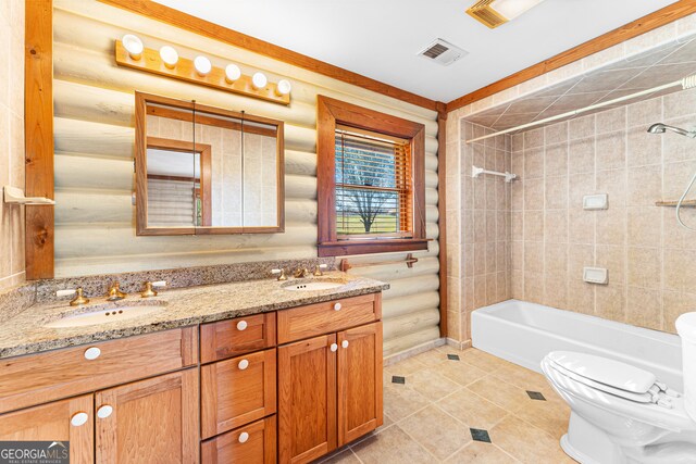 full bathroom featuring log walls, tile patterned floors, toilet, vanity, and tiled shower / bath