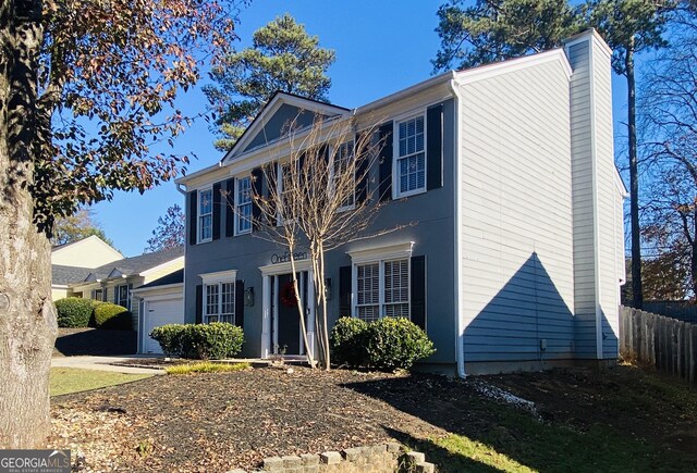 view of front of property with a garage