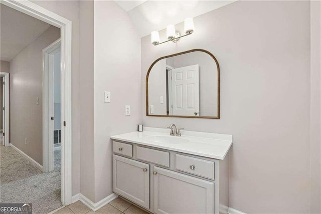 bathroom with vanity and tile patterned floors