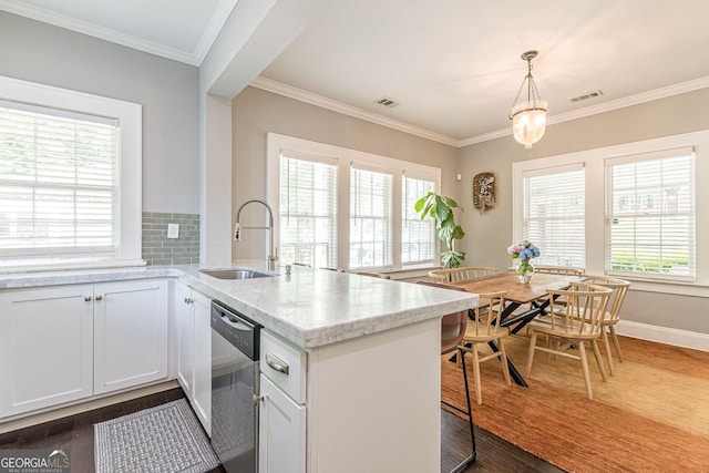 kitchen with dishwasher, dark hardwood / wood-style flooring, white cabinets, and sink