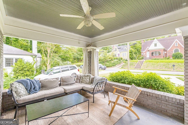 sunroom / solarium with ceiling fan