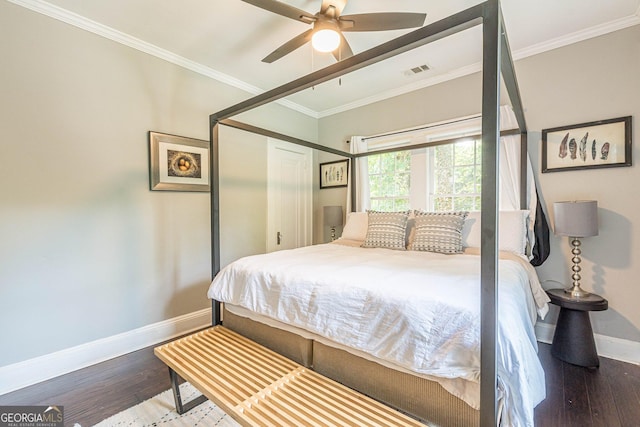 bedroom with ceiling fan, wood-type flooring, and crown molding