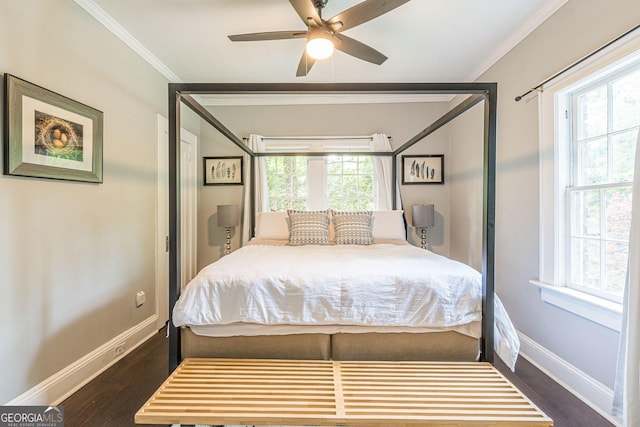 bedroom featuring multiple windows, ceiling fan, and dark wood-type flooring