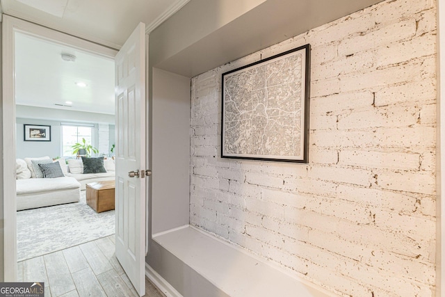 bathroom with hardwood / wood-style flooring