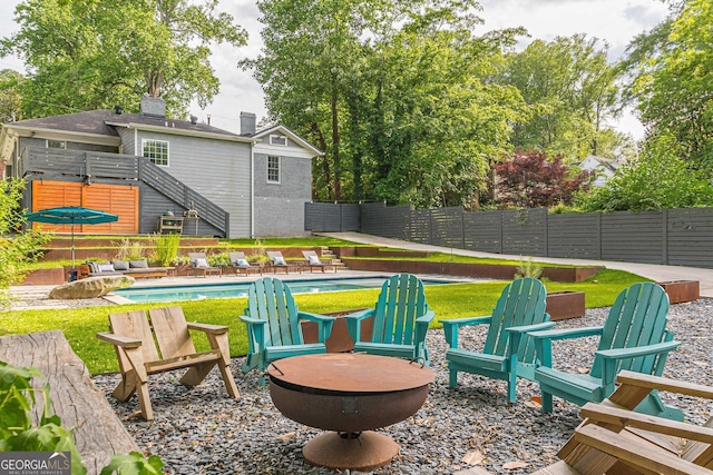 view of patio / terrace featuring a fenced in pool