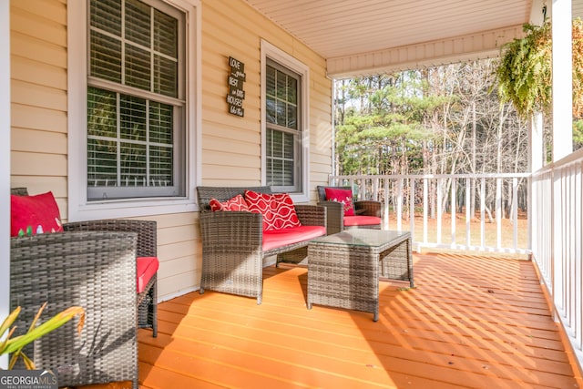 wooden terrace with a porch